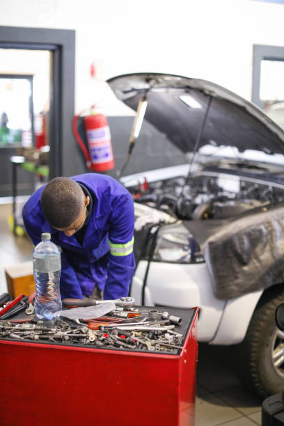 diesel technicians working on an engine.